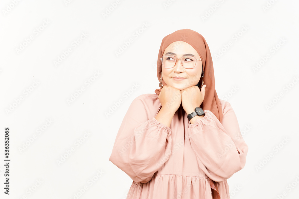 Imagining something beautiful and smiling of Beautiful Asian Woman Wearing Hijab Isolated On White