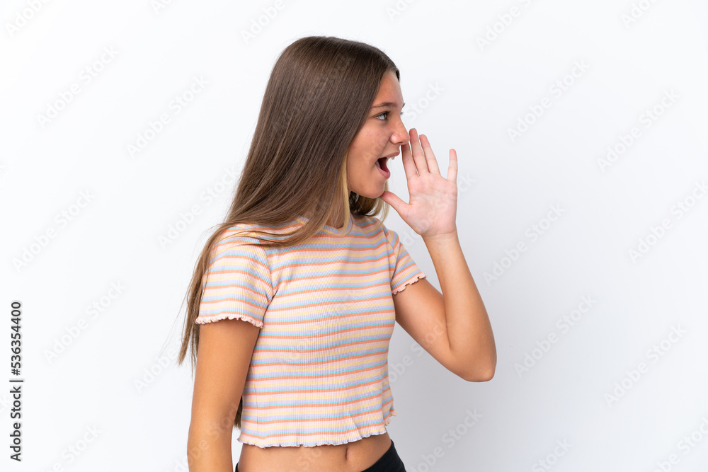 Little caucasian girl isolated on white background shouting with mouth wide open to the side Little caucasian girl isolated on white background shouting with mouth wide open to the side