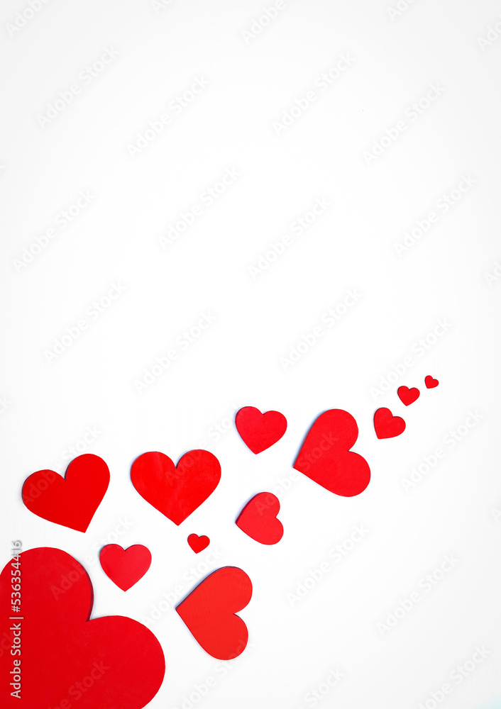 Group of red hearts (big, small) on white background. Valentines Day, Mothers Day, International Women's Day, anniversary, love concept. Flat lay