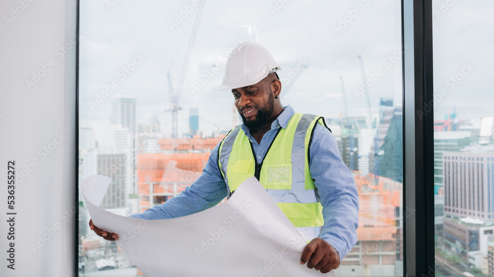 Portrait of Engineers looking camera and people concluding their meeting architectural project as a team. Portrait of Engineers looking camera and people concluding their meeting architectural project as a team.