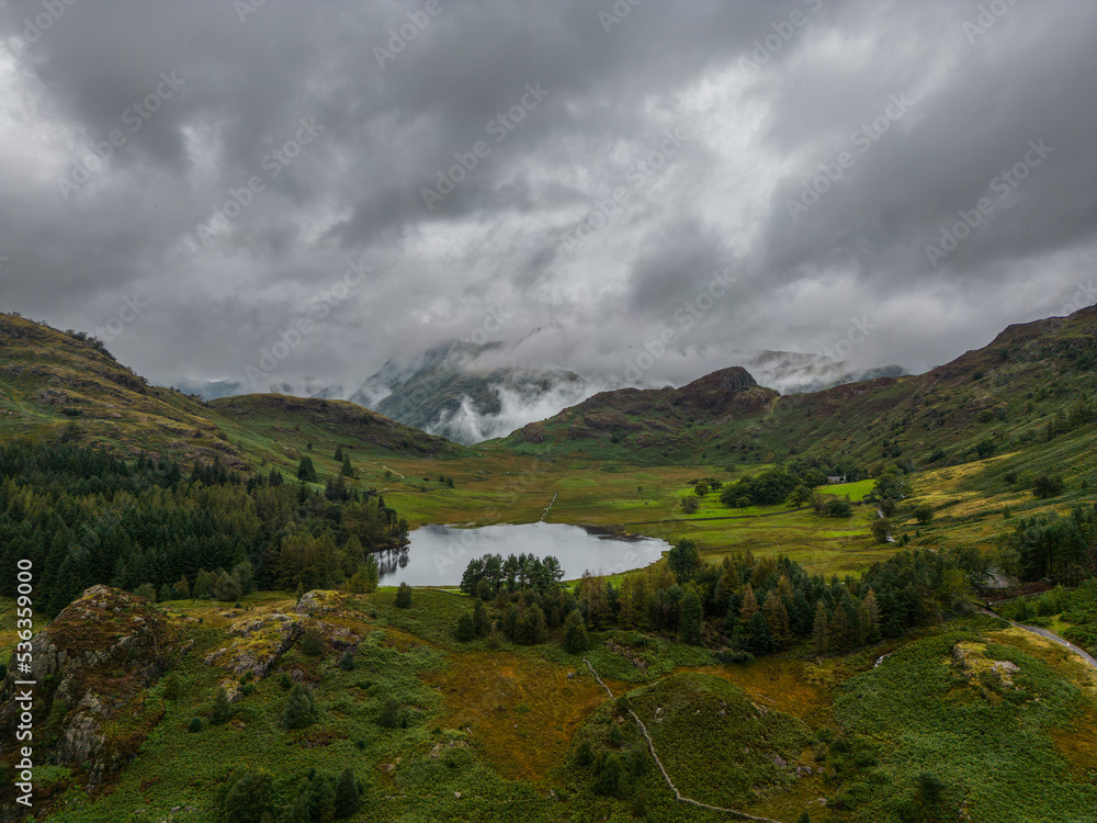 Mist and low cloud envelop the Langdale hills with Blea Tarn