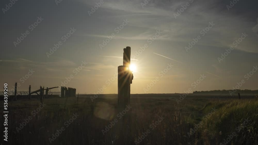 Beautiful sunrise timelapse over nature reserve. Abstract sculpture. Beautiful sunrise timelapse over nature reserve. Abstract sculpture.