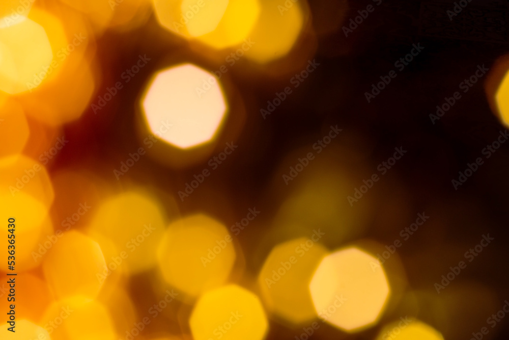 Defocused abstract background of warm lights of a Christmas garland Defocused abstract background of warm lights of a Christmas garland