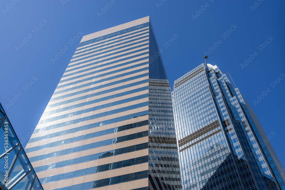 Business office tower from low angle with blue sky
