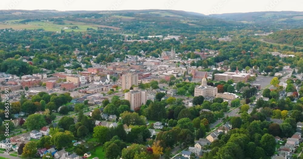 Early fall late afternoon aerial video of the downtown streets, City of Cortland NY, Cortland County, USA. Early fall late afternoon aerial video of the downtown streets, City of Cortland NY, Cortland County, USA.