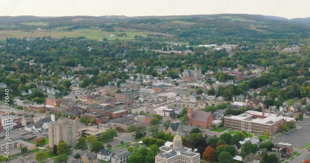Early fall late afternoon aerial video of the downtown streets, City of Cortland NY, Cortland County, USA. Early fall late afternoon aerial video of the downtown streets, City of Cortland NY, Cortland County, USA.