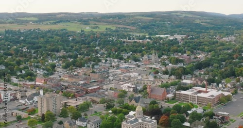 Early fall late afternoon aerial video of the downtown streets, City of Cortland NY, Cortland County, USA.   photo