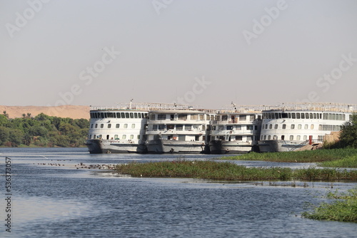 Nile Cruise ships parked on riverside in Aswan  Egypt 