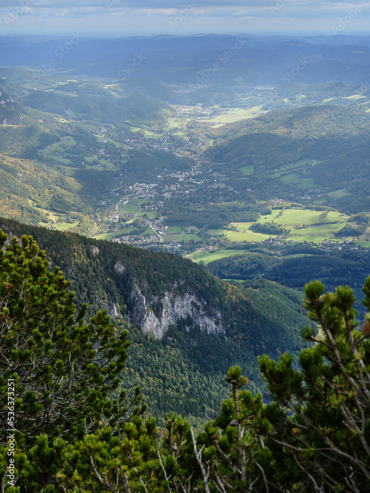 View of the surrounding villages and hills from the Rax mountain range in Austria