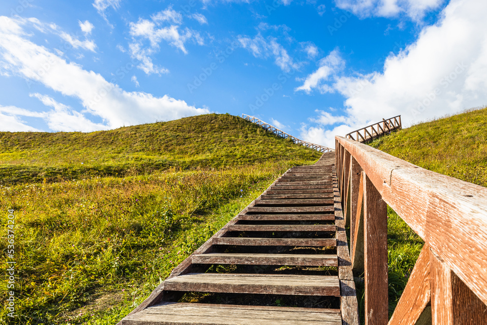 Wooden stairs going up to the historical mound of Seredzius, Lithuania