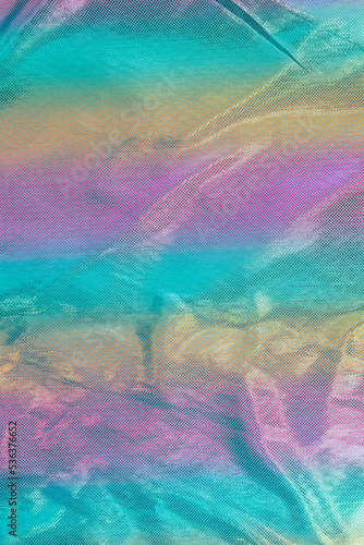 Blurred rainbow light refraction texture overlay effect for photo and mockups. holographic flare,holographic style texture background reflective fabric