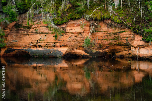 red rock reflecting in the river