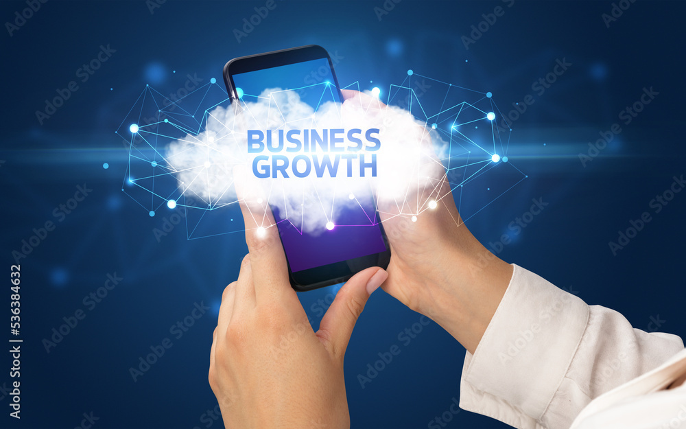 Hand using smartphone with cloud business concept Hand using smartphone with cloud business concept