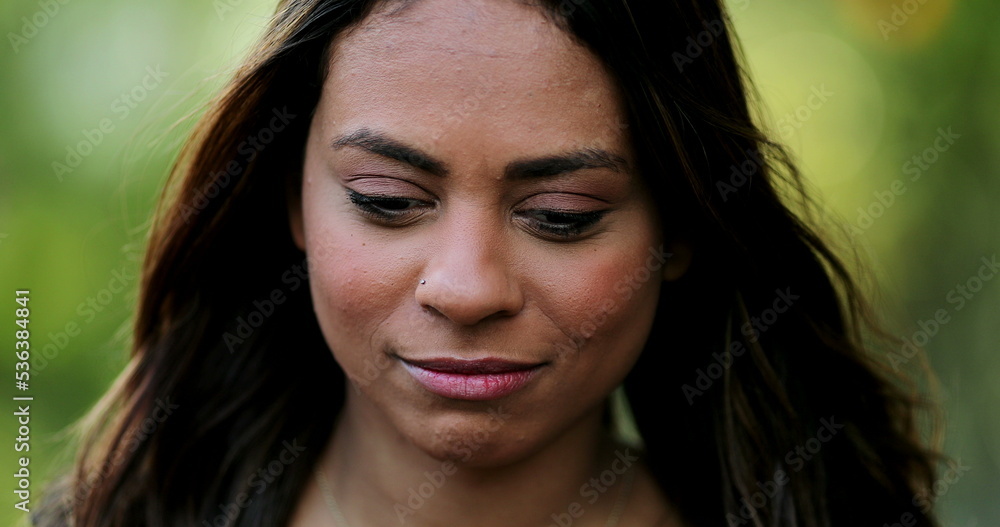 Pensive thoughtful hispanic woman feeling confused and in doubt Pensive thoughtful hispanic woman feeling confused and in doubt