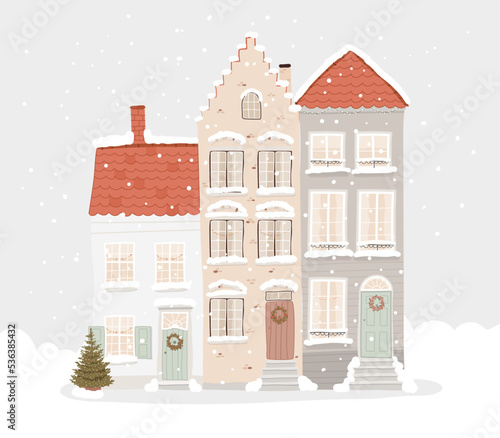 Isolated three European houses with Christmas decorations and a Christmas tree. Snowy old town landscape. Hand-drawn vector illustration in flat style