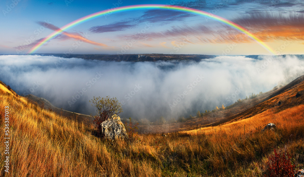 colorful rainbow over river canyon. autumn landscape. nature of Ukraine colorful rainbow over river canyon. autumn landscape. nature of Ukraine