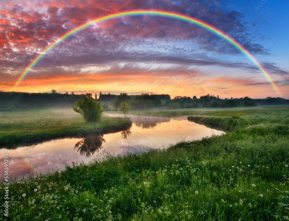 Naklejka premium Landscape with a Rainbow on the River in Spring. colorful morning. nature of Ukraine