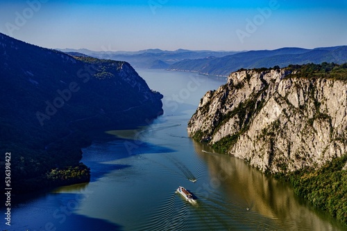 Fotografi Aerial view of boat in Iron Gates gorge on the river Danube in Romania