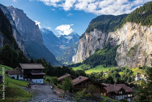 View of Lauterbrunnen Swiss town with Staubbach waterfall on its side. This village is one of the most touristic places in Switzerland