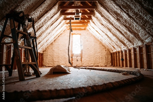 фотографія Inside view of an attic covered with spray foam
