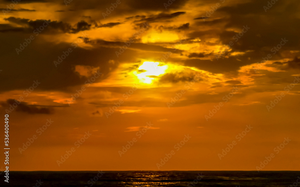 Colorful golden sunset big wave and beach Puerto Escondido Mexico. Colorful golden sunset big wave and beach Puerto Escondido Mexico.