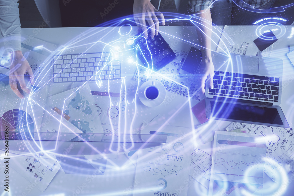Double exposure of man and woman working together and education theme hologram drawing. Computer background.