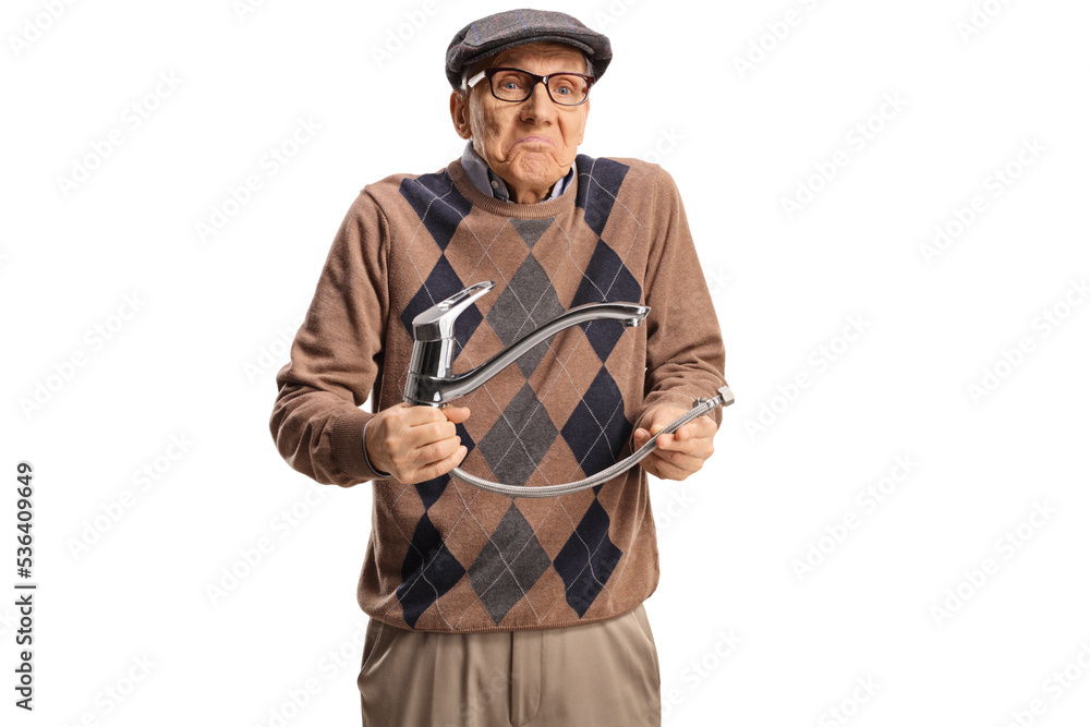 Confused elderly man holding a steel hose with water tap Confused elderly man holding a steel hose with water tap