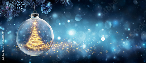 Christmas Tree In Snow Ball Hanging Fir Branch With Golden Glittering On Blue Abstract Night