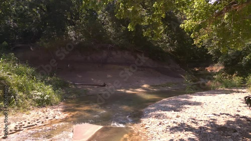 Rowlette Creek Preserve in the deep woods of Allen, Texas surrounded by trees photo