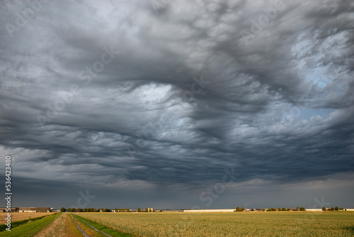 Tableau sur toile Stormy sky over the countryside