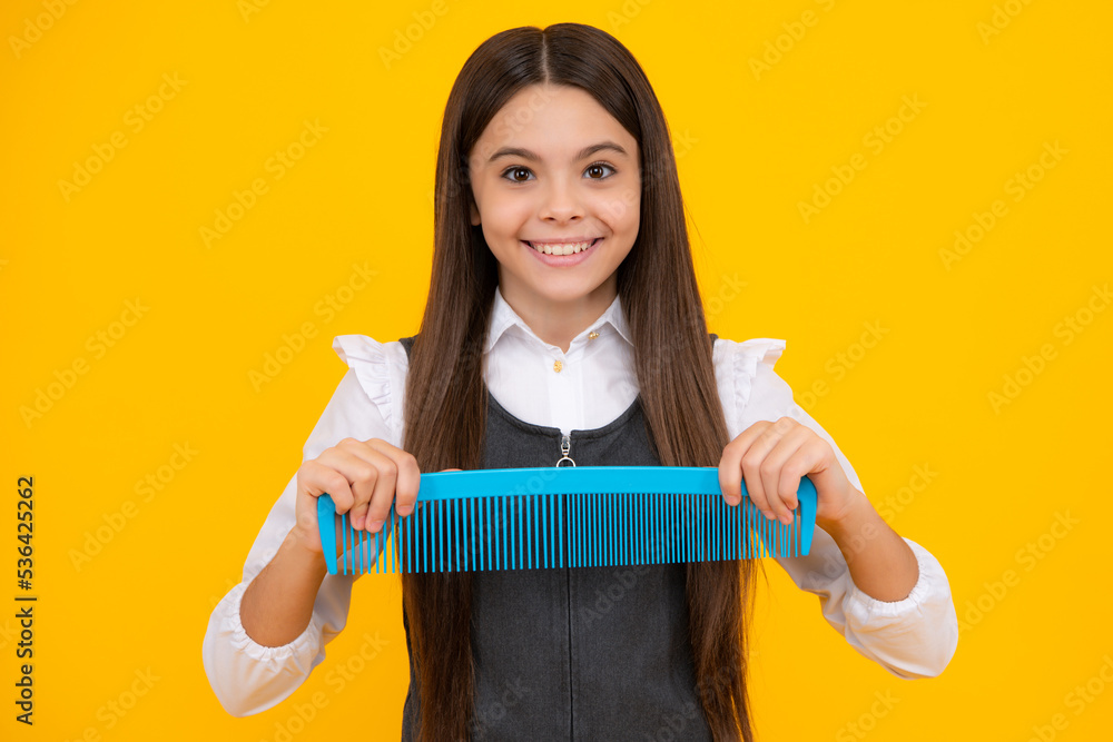 Teen girl girl with brush combing hair. Girl taking haircare and hairstyle. Hairdresser hair solon for teenager. Teen girl girl with brush combing hair. Girl taking haircare and hairstyle. Hairdresser hair solon for teenager.