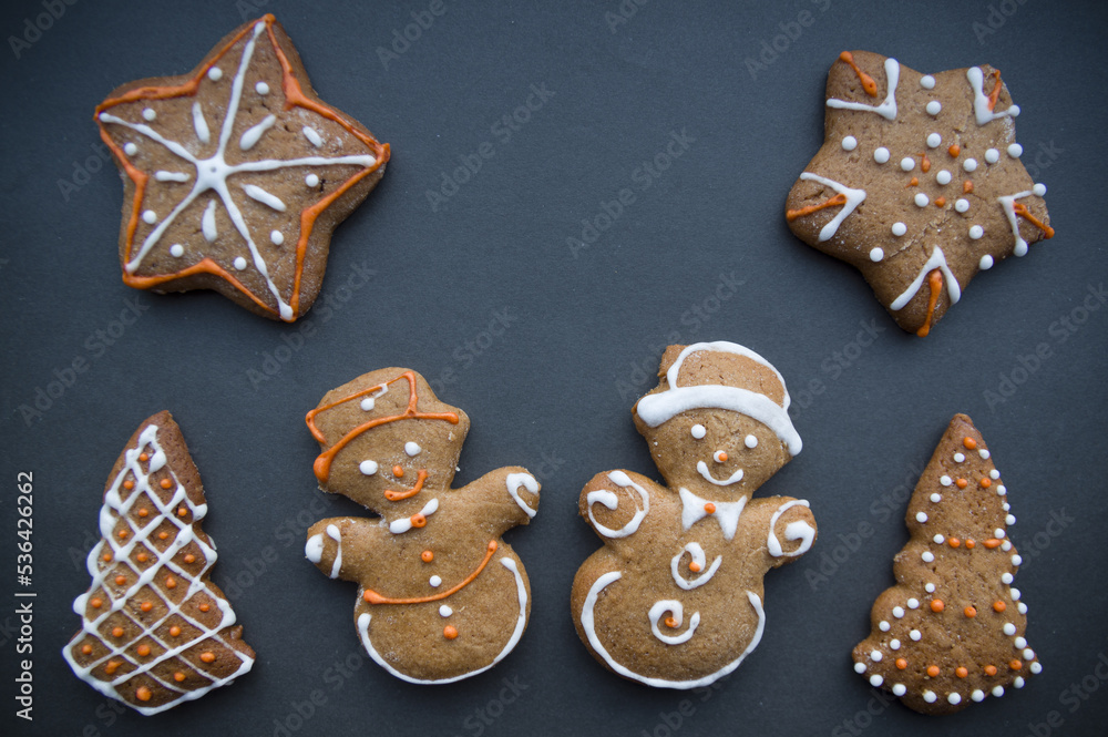 Set of different homemade Christmas cookies isolated on background, close up view with copy space for text. New year frame with tasty gingerbread cookies with spices. Winter holiday concept Set of different homemade Christmas cookies isolated on background, close up view with copy space for text. New year frame with tasty gingerbread cookies with spices. Winter holiday concept