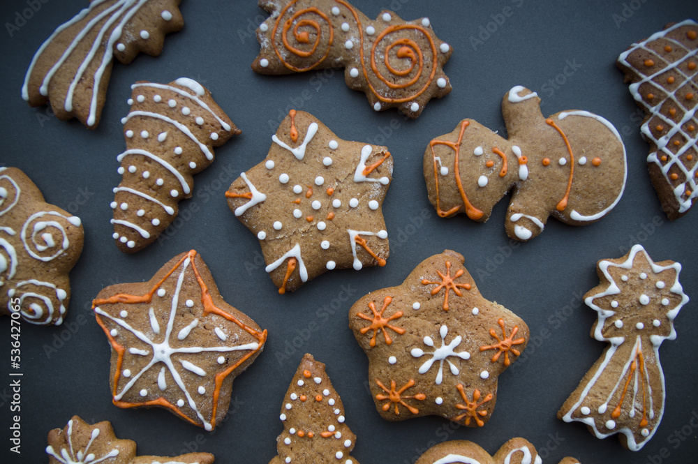 Set of different homemade Christmas cookies isolated on background, close up view with copy space for text. New year frame with tasty gingerbread cookies with spices. Winter holiday concept
