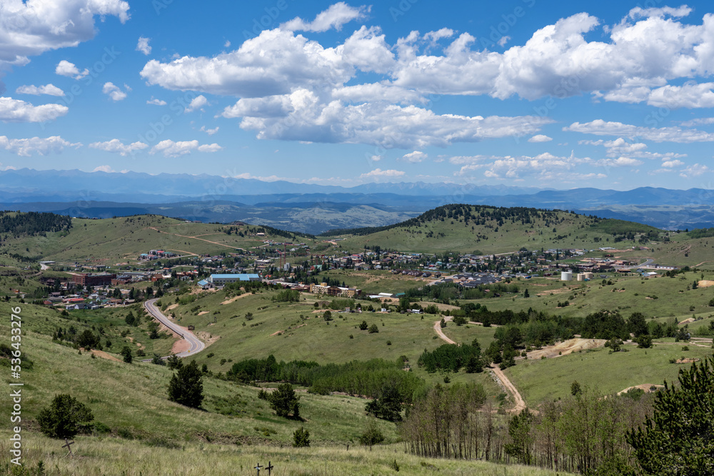 looking down onto the town of Cripple Creek, Colorado and the surrounding mountains