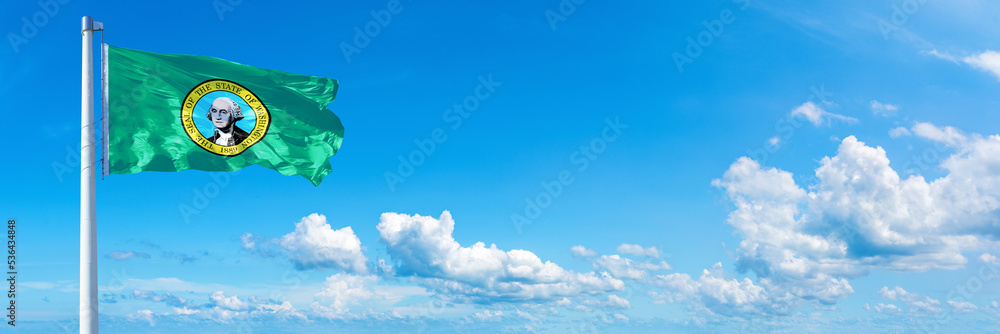 Washington - state of USA, flag waving on a blue sky in beautiful clouds - Horizontal banner - obrazy, fototapety, plakaty 