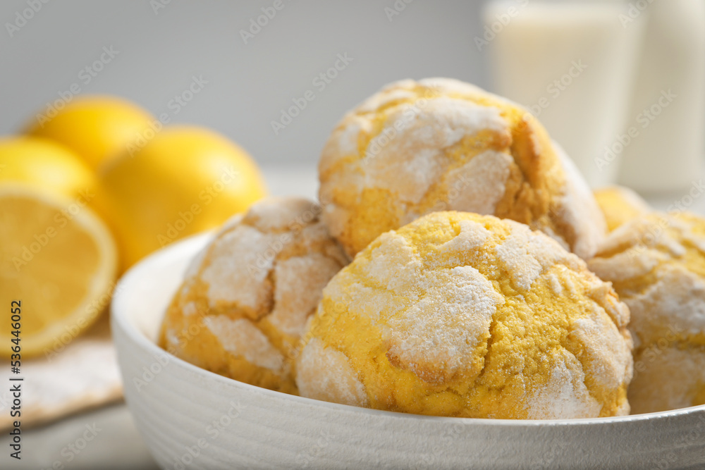Delicious lemon cookies in bowl on table, closeup Delicious lemon cookies in bowl on table, closeup