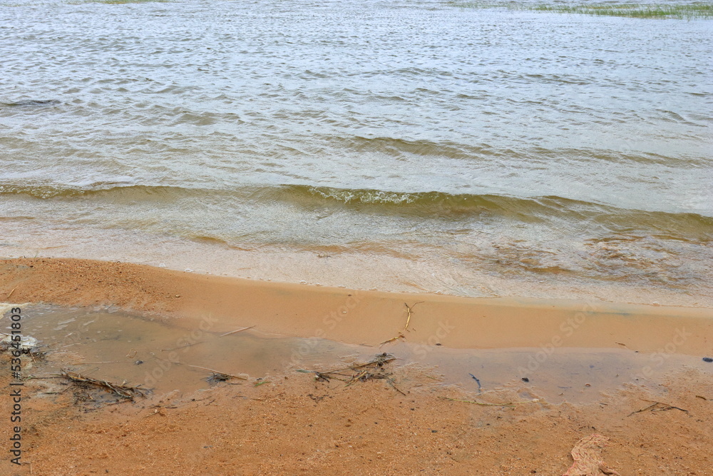 Transparent clear water on the sand beach Transparent clear water on the sand beach