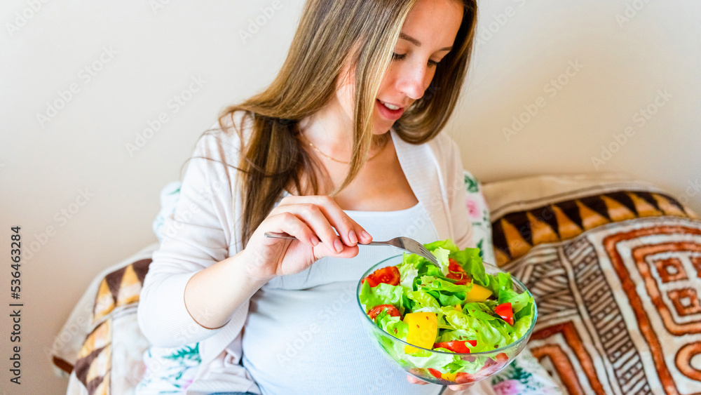 Pregnancy eating healthy salad. Happy pregnant woman eating nutrition food. People lifestyle food concept. Pregnancy eating healthy salad. Happy pregnant woman eating nutrition food. People lifestyle food concept.