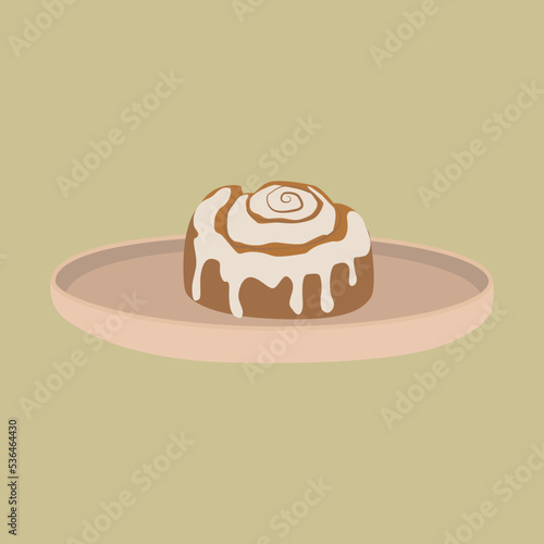 Pumpkin spice cinnamon roll on the plate