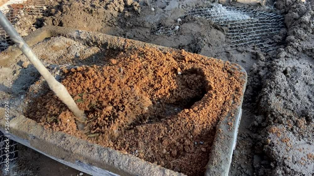 Video Stock Mixing mortar with a mixer. Cement mortar mix. Mortar