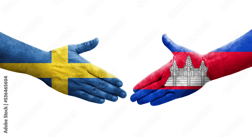 Handshake between Cambodia and Sweden flags painted on hands, isolated transparent image. Handshake between Cambodia and Sweden flags painted on hands, isolated transparent image.