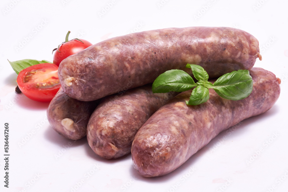 Raw beef or pork grill sausage isolated on white background Raw beef or pork grill sausage isolated on white background
