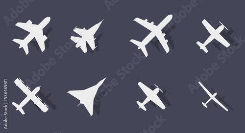 Eight aircraft of different types airplane silhouette with shadow. Passenger and military. Jet and propeller. Aircraft top view icon. Flat vector illustration isolated on dark background.