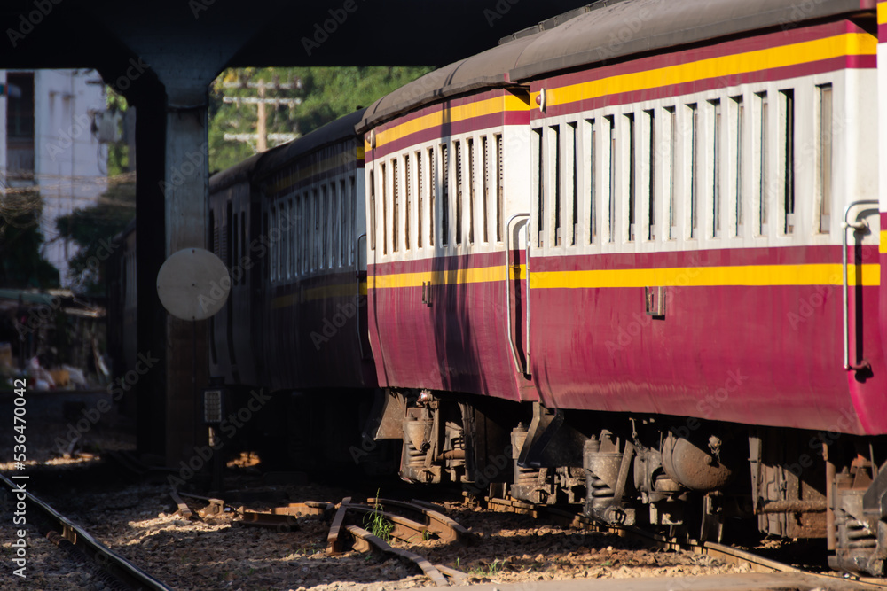 Thai railway train with locomotive runs in Bangkok Thai railway train with locomotive runs in Bangkok