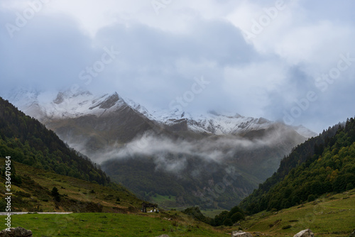 Landscape of snow-capped Pyrenean peaks, in the Ossau valley, in Béarn, France