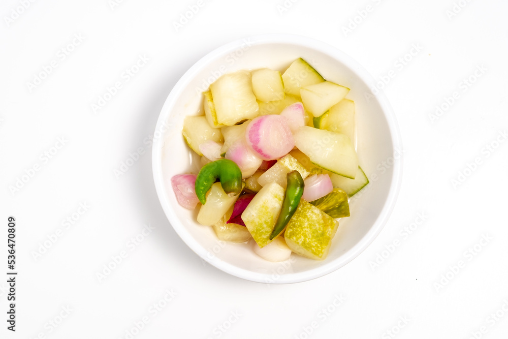Typical Indonesian cucumber pickle, usually cucumber cut into squares with the addition of shallots and whole cayenne pepper
Typical Indonesian cucumber pickle, usually cucumber cut into squares with the addition of shallots and whole cayenne pepper