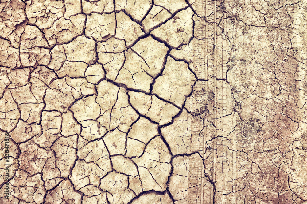 cracks on the ground desert texture background earth climate ecology