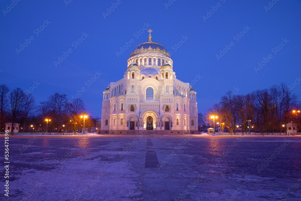 View of the Naval Cathedral of St. Nicholas the Wonderworker on Anchor Square in March evening. Kronstadt. Saint-Petersburg, Russia