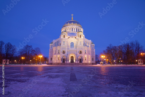View of the Naval Cathedral of St. Nicholas the Wonderworker on Anchor Square in March evening. Kronstadt. Saint-Petersburg, Russia