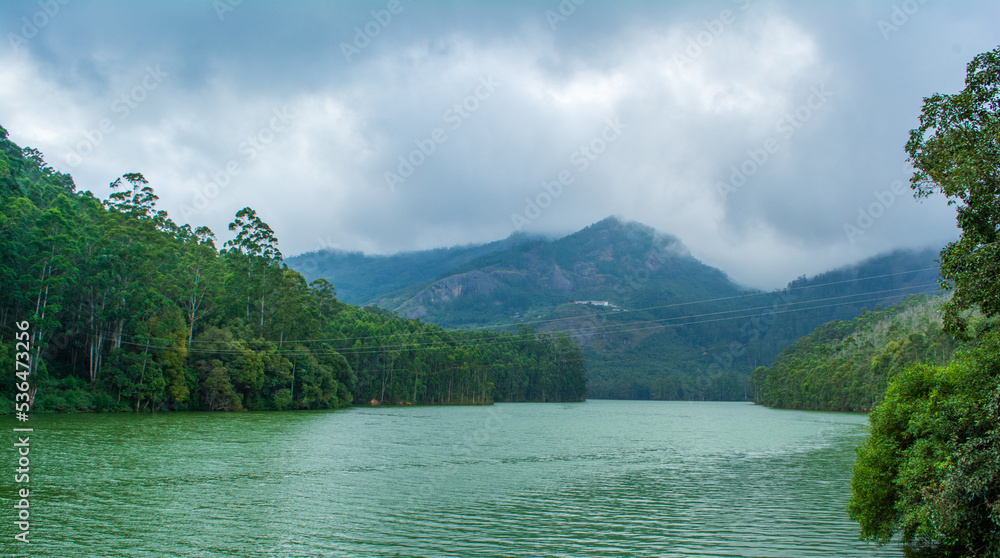 Munnar, the famed hill station of south India, is a romantic locale where natural beauty is everywhere to visit, explore and to enjoy. Munnar is situated at the confluence of three mountain streams